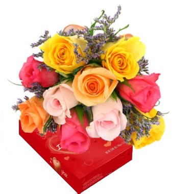 Bouquet de 12 rosas multicolor. Incluye Chocolates